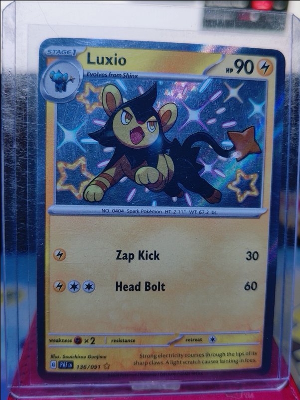 Luxio #136/091 Paldean Fates